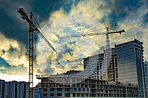 Construction of new residential buildings against the sky .