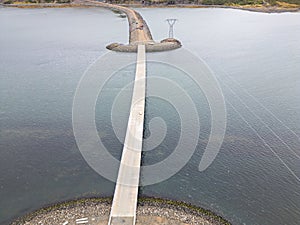 Construction of a new road and bridge across Thorskafjordur fjord in Iceland