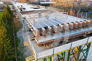 Construction of the new road bridge. Beams with steel reinforcement from above