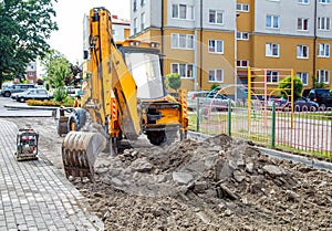 Construction of a new road. excavator prepares the surface