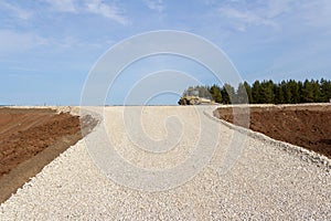 Construction of a new road. Road pavement layers. The composition of the road during its construction