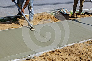 Construction of new sidewalks laying concrete cement