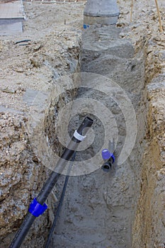 Construction of a new water supply system, pipe in trench