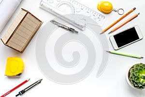 Construction office with architect tools on white background top view mockup