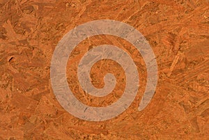 Construction oriented chipboard covered with brown varnish, original woody background-plate photo