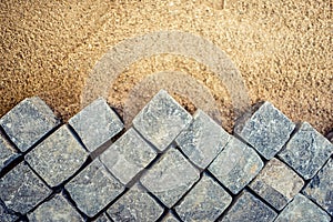 Construction of pavement details, cobblestone pavement, stone blocks on road building