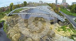 construction of the pedestrian arch bridge over a photo