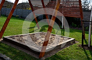 Construction of a pergola shading the kindergarten playground with a sandpit. board battens are just the place where it is necessa