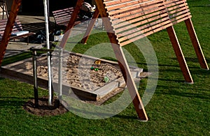 Construction of a pergola shading the kindergarten playground with a sandpit. board battens are just the place where it is necessa