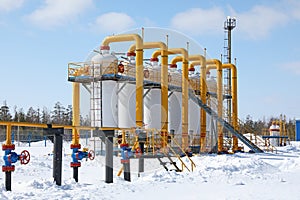 Construction of the pipeline during the winter day in Siberia