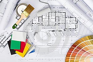 Construction plans with whitewashing Tools and Colors Palette on photo
