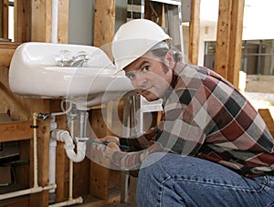 Construction Plumber Working