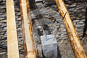 Construction pole with cement and rebar
