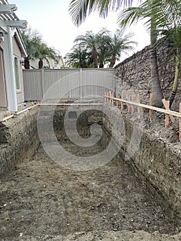 Construction of pool in backyard