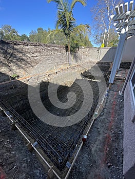 Construction of pool in backyard