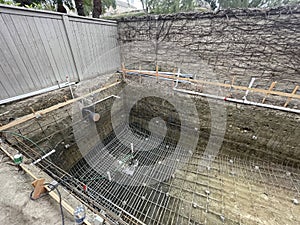 Construction of pool in backyard