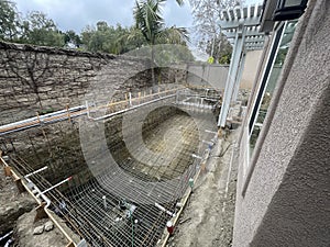 Construction of pool in backyard