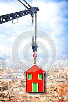 The construction of a prefabricated house - concept image