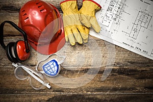 Construction protective workwear with plans photo