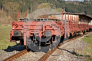 Construction of railway tracks. Railway infrastructure. Railroad car loaded with rails. Rails on a wagon ready for track