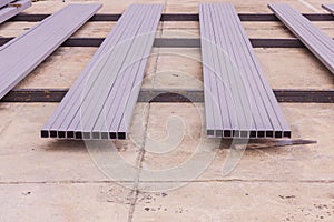 Construction: Rectangular steel tube with anti-rust paint preparing for fabrication of structural work