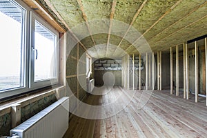 Construction and renovation of big light spacious empty room wit