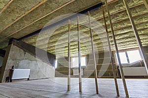 Construction and renovation of big light spacious empty room wit