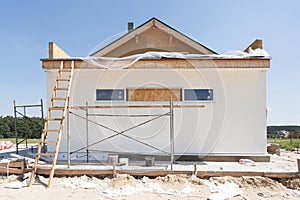Construction or repair of the rural house with insulation, eaves