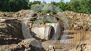 Construction of the river drains. Construction drains to prevent flooding in the city. Drain water into the river