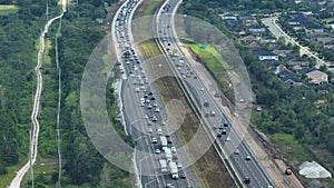 Construction roadworks on American transport infrastructure. Renovation of highway road interchange with slow moving