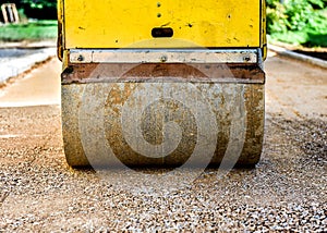 Construction roller or steamroller during road construction. Asp