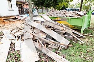 Construction rubbish bin with loads at construction site.