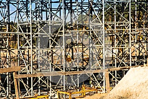 Construction scaffolding built under an overpass over the highw