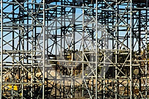 Construction scaffolding built under an overpass over the highw