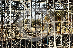 Construction scaffolding built under an overpass over the highw