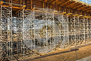 Construction scaffolding built under an overpass over the highw