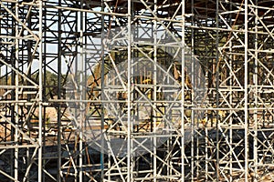 Construction scaffolding built under an overpass over the highw