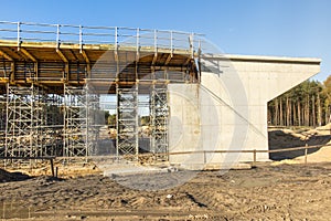 Construction scaffolding built under an overpass over the highw