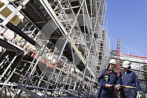 Construction scaffoldings and workers