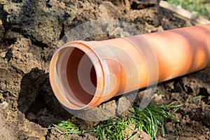 Orange sewer pipe