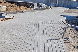 Construction of sidewalk with cobblestones
