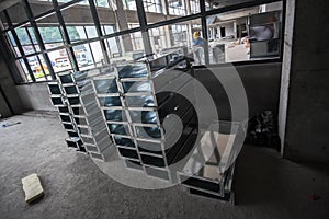 Construction Site with Air Ducts and Worker