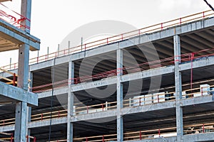 Construction site background with gray building and clear sky