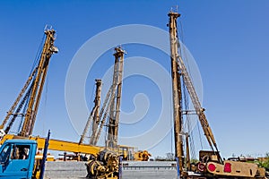 Construction site with big equipment for drilling into the groun