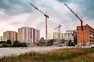 Construction site. Big industrial tower cranes