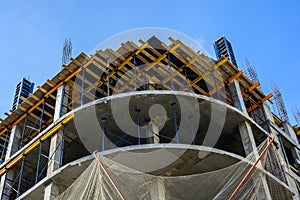 Construction site of building with scaffoldings