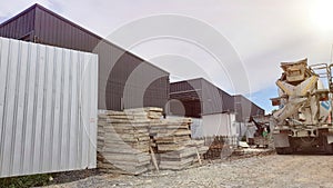 Construction site with a cement truck for pouring concrete or mixing cement.