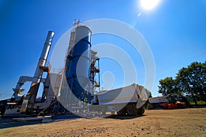 Construction site. Construction of a plant for the production of asphalt. Modern plant, factory.