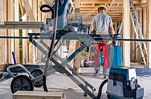 Construction Site Contractor Worker and His Professional Equipment