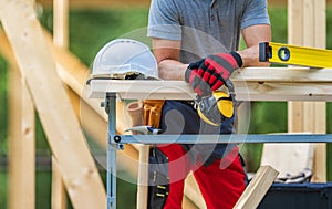 Construction Site Contractor Worker with Noise Reduction Headphones